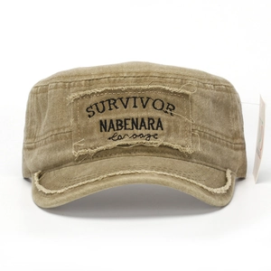 Detail of khaki washed cotton cadet hat with vintage distressed edges and survivor embroidery