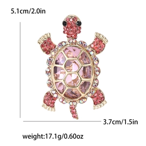 Detailed size and weight specs for a gold turtle brooch with pink rhinestones