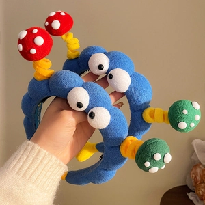 Cerchietto divertente in peluche blu con occhi di fungo e design antiscivolo unico