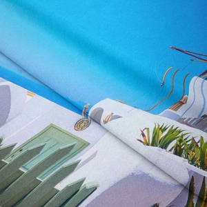 Detail of Santorini landscape wall tapestry fabric texture and vibrant blue printed design