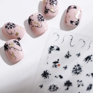 Ink style floral nail stickers with gold foil accents and 5D matte texture on white base