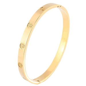 Luxurious gold stainless steel bangle with circular embossed pattern on white background