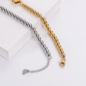 Detailed comparison of gold and silver beaded chains in stainless steel material