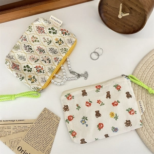 Small Korean style floral and bear print fabric pouches for makeup storage with neon rope