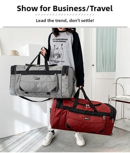 Detail view of large capacity nylon travel bags in grey and burgundy colors with side pockets
