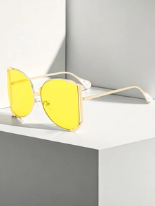 Detail showing square gold metal frames with yellow lenses and pearl temple tips