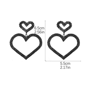 Detailed size view of black rhinestone heart earrings measuring 6.5cm by 5.5cm