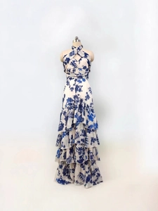 Bohemian ivory floral tiered maxi dress with halter neckline and layered ruffle skirt