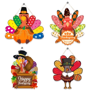 Set of four wooden Thanksgiving door hangers with colorful turkey and autumn designs