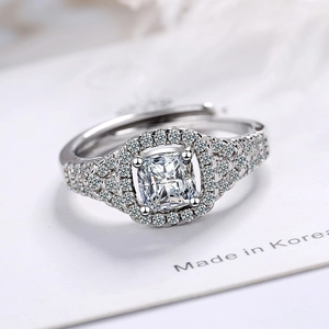 Classic cushion cut halo ring in silver with pavé-set sparkling cubic zirconia