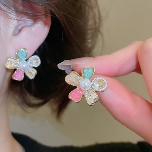 Floral stud earrings with colorful petals and pearl center in elegant Korean style
