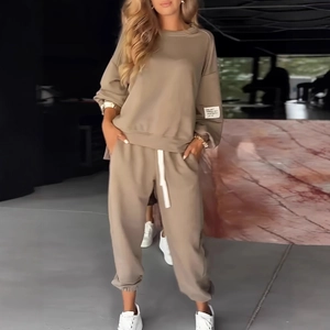 Knitted two-piece set featuring long sleeve top and wide leg pants in khaki color