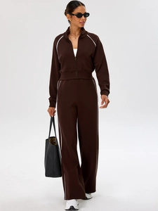 Deep brown five-piece yoga set with white piping and zip-up jacket for fitness