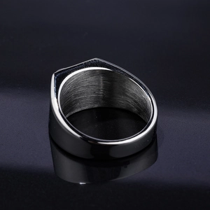 Polished silver anchor ring for men and women featuring smooth brushed inner band finish