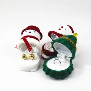 Christmas themed velvet jewelry boxes in Santa Claus, snowman, and tree shapes