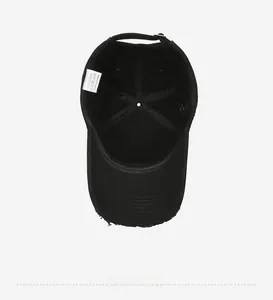 Internal view of black vintage cotton baseball cap with adjustable metal buckle and label