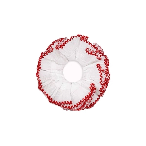 Oversized white cotton scrunchie with red scalloped lace trim and pleated texture