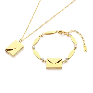 Gold envelope pendant necklace and bracelet set with diamond accents and K18 hallmark