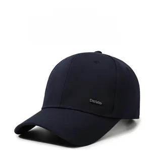 Close-up of navy baseball cap with fine vertical texture and Daria metal logo