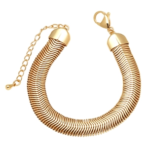 Close-up of golden woven texture bracelet with adjustable lobster clasp and chain