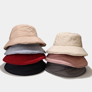 Padded winter bucket hats in multiple colors featuring a lightweight quilted design