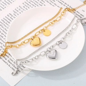 Double-layered 18K gold-plated titanium steel heart bracelet for women in gold and silver