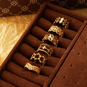 French retro hollow crown flower ring set in 18K gold plated steel on velvet