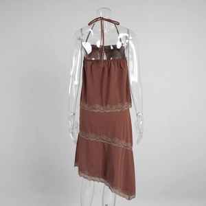 Detail view of the brown lace-trimmed back on this halter top and mini skirt set