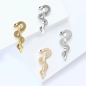 Elegant gold and silver enamel snake brooches in Caduceus design for suits and coats