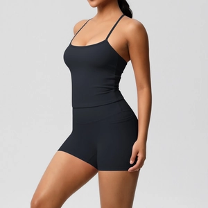 Detail of high-waist yoga shorts with functional side pocket and elastic fabric texture