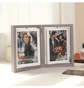 Close-up of double-sided rotating wood frame with a 360-degree swivel hinge design