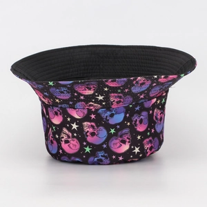 Detail of leopard skull and colorful stars print on a black cotton bucket sun hat