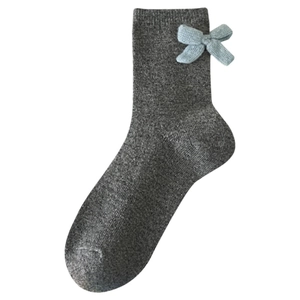 Gray knitted wool mid-calf socks with light blue bow detail on clean white background