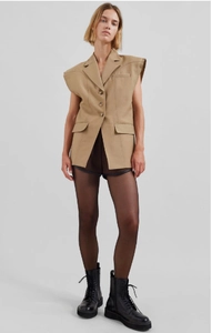 Detail view of khaki sleeveless vest blazer with notch lapels and flap pockets