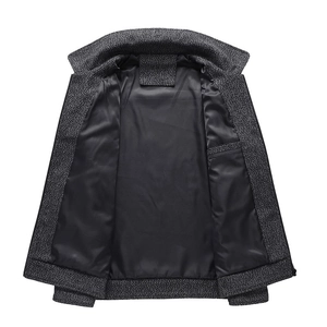Detail of dark grey wool blend jacket with smooth black lining and interior welt pocket