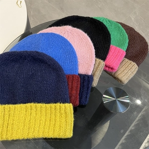 Minimalist two-tone knitted beanie hats for women in various stylish color combinations