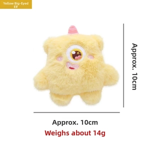 Detail view of yellow plush monster keychain with size 10cm and weight 14g specs