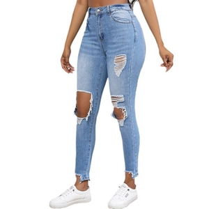 High-waist light blue slim-fit ripped jeans with distressed details for a trendy street look