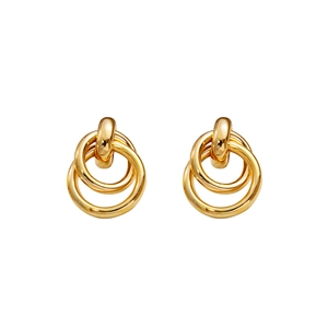 Macro detail of three interlocking golden geometric rings with a high-polished mirror finish