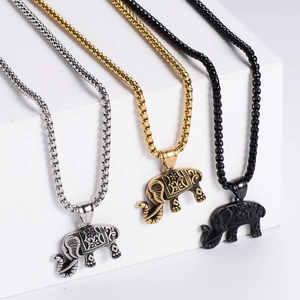 Three elephant pendant necklaces in silver gold and black with engraved metal details