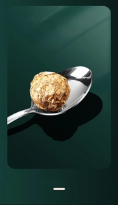 Polished stainless steel dinner spoon with mirror finish and elegant chocolate detail
