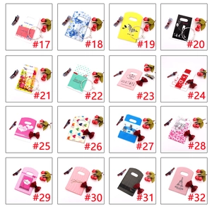 Grid view of 16 mini plastic gift bags with diverse patterns for jewelry packaging