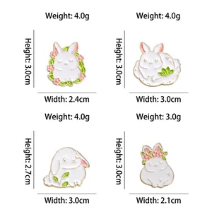 Set of four cute white rabbit alloy enamel brooches with size and weight specifications