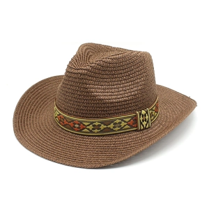 Detail of dark brown cowboy straw hat with ethnic geometric band and woven texture