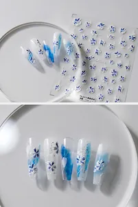Macro view of blue and white watercolor floral 5D embossed nail art stickers TS-2313