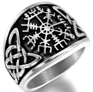 Detail of vintage Viking Vegvisir compass and Celtic knot patterns on stainless steel ring
