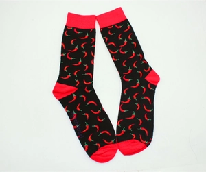 Detail view of cotton crew socks featuring red chili pepper pattern and contrast heels