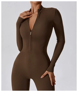 Detail of coffee-colored high-stretch bodysuit featuring stand collar with a half-zip closure