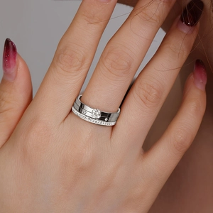 Detail of silver double-layered ring with a large center zircon and pave accents