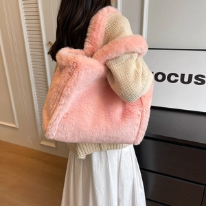 Pink plush faux fur tote bag for women showing a soft texture and large capacity